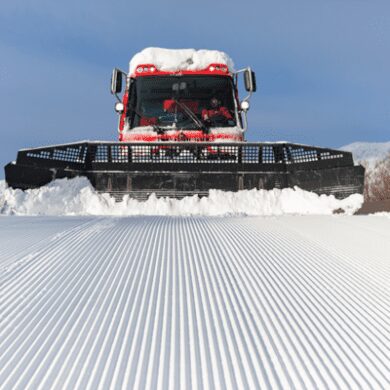 Snowcat grooming snow