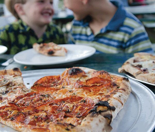 kids eating outside, pizza