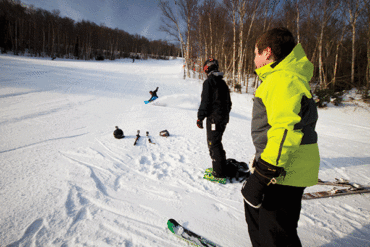kids skiing and snowboarding