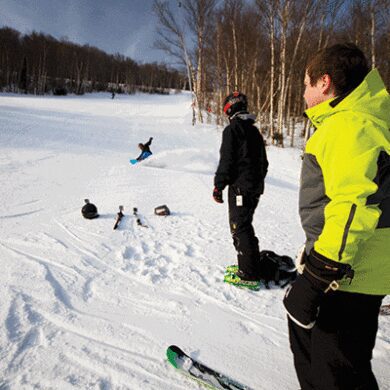 kids skiing and snowboarding
