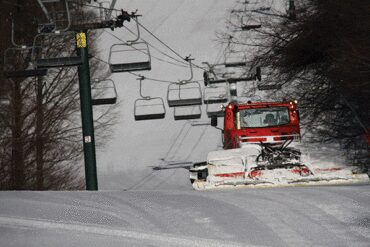 A groomer making his final morning passes.