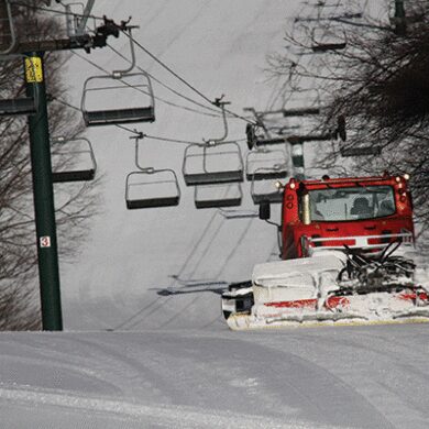 A groomer making his final morning passes.