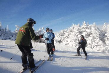 group of skiers lesson
