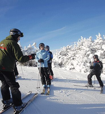 group of skiers lesson